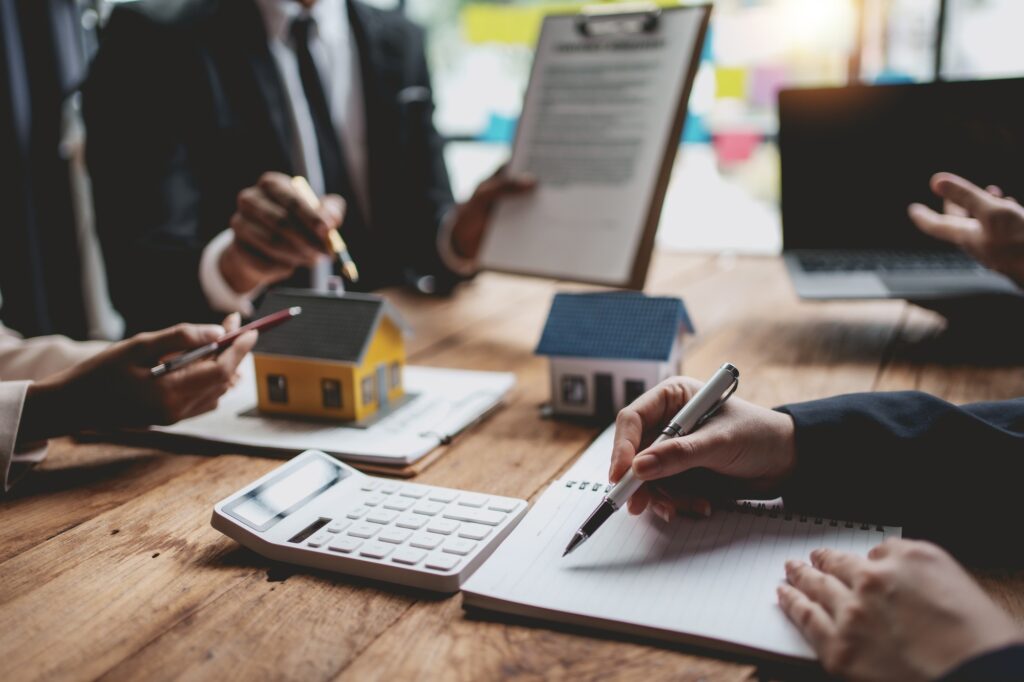 Business people meeting together about real estate. Working as a teamwork of real estate businesses.